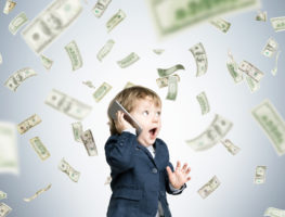 child with money raining down