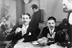 Two men sitting together at a restaurant