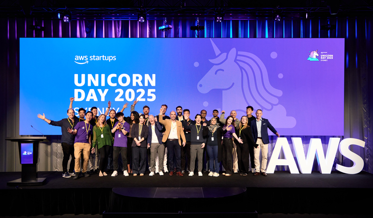 aws unicorn day team on stage